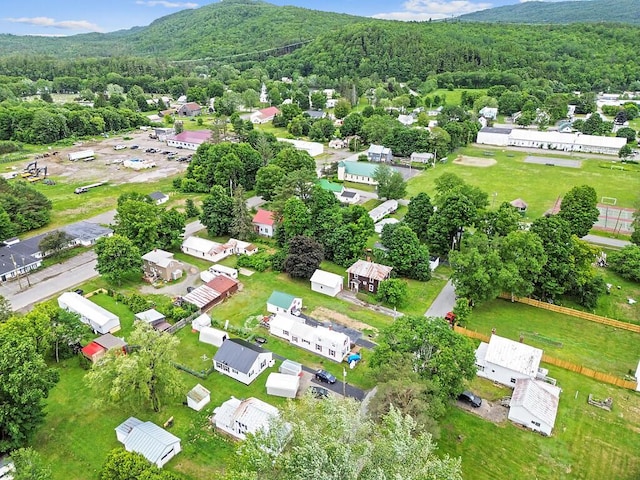 7 James St, Bingham, ME 04920 - drone / aerial view of a forest and a mountain backdrop