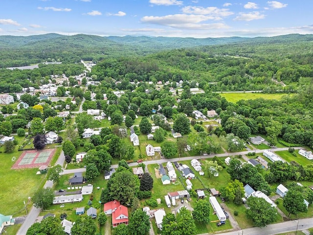 7 James St, Bingham, ME 04920 - drone / aerial view of a forest and a mountain backdrop