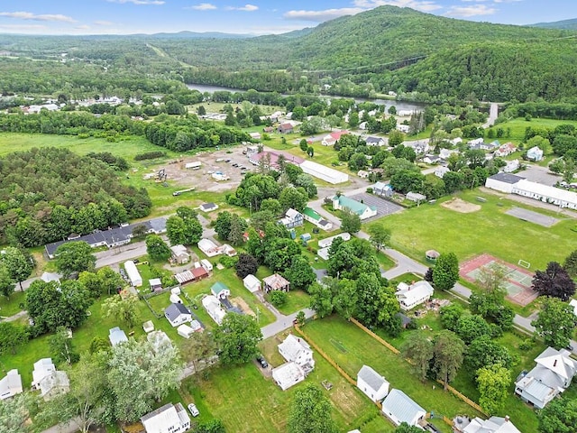 7 James St, Bingham, ME 04920 - bird's eye view of a heavily wooded area and mountains