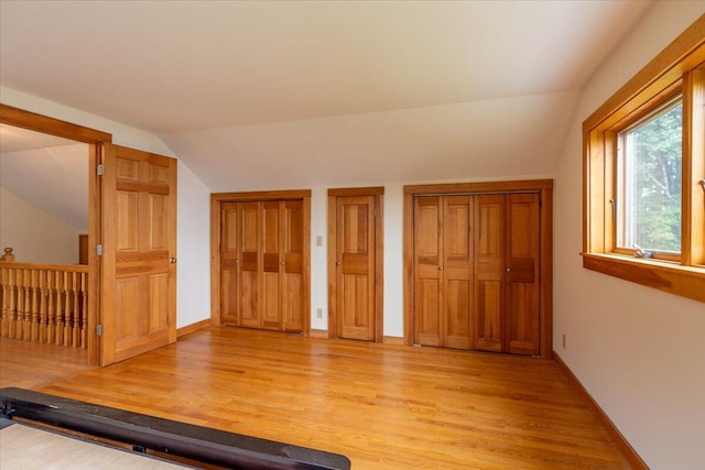 391 Main Rd, Islesboro, ME 04848 - exercise area featuring vaulted ceiling and light wood-style floors