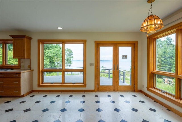 391 Main Rd, Islesboro, ME 04848 - doorway featuring light floors, french doors, recessed lighting, and a chandelier