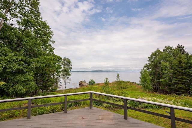 391 Main Rd, Islesboro, ME 04848 - wooden terrace featuring a water view