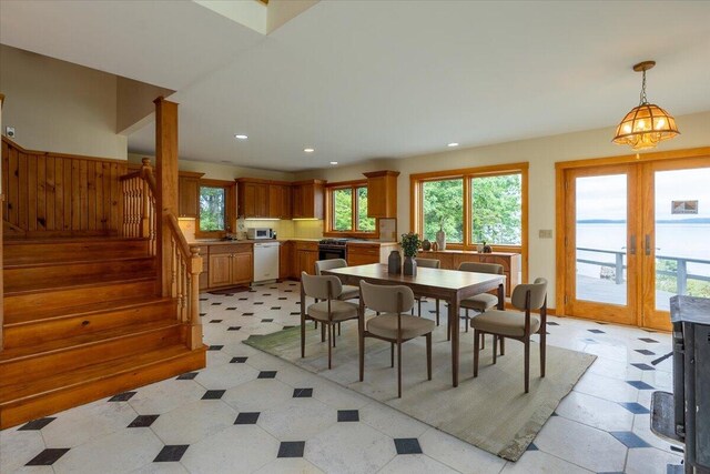 391 Main Rd, Islesboro, ME 04848 - dining area featuring stairs, recessed lighting, french doors, and wooden walls