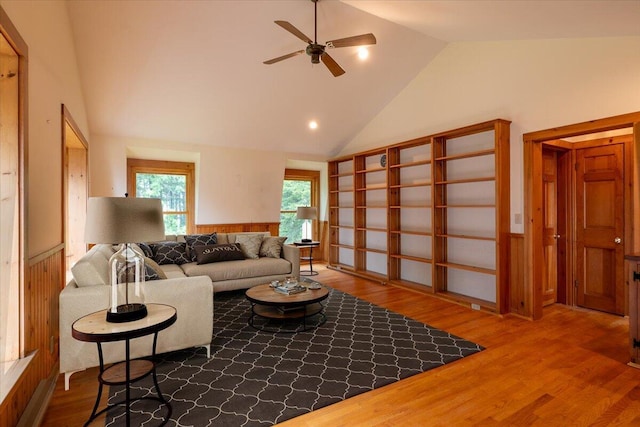 391 Main Rd, Islesboro, ME 04848 - living room with wood finished floors, ceiling fan, and high vaulted ceiling