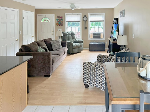 1016 State St Unit 7, Bangor, ME 04401 - living room with ceiling fan, cooling unit, and light tile patterned flooring