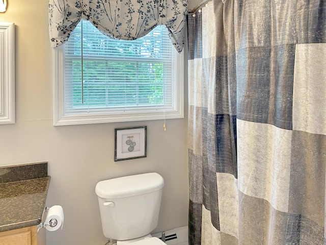1016 State St Unit 7, Bangor, ME 04401 - full bath with vanity, a shower with shower curtain, and baseboard heating