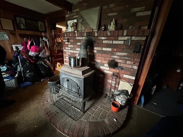 258 Guinea Rd, Biddeford, ME 04005 - living area featuring a wood stove