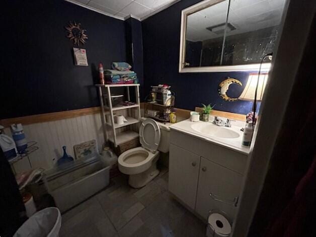 258 Guinea Rd, Biddeford, ME 04005 - full bathroom with vanity, a shower with door, wainscoting, tile patterned floors, and a tub to relax in