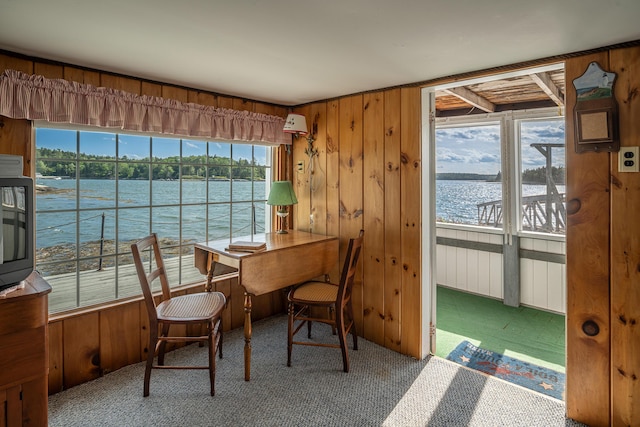 122 Isle Of Springs Rd, Boothbay, ME 04537 - carpeted dining area with a water view and wooden walls