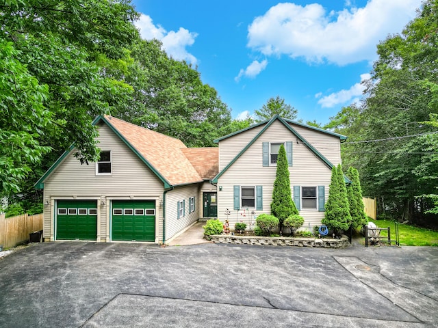 146 Lone Indian Trl, Augusta, ME 04330 - view of front of house with a garage, driveway, and roof with shingles