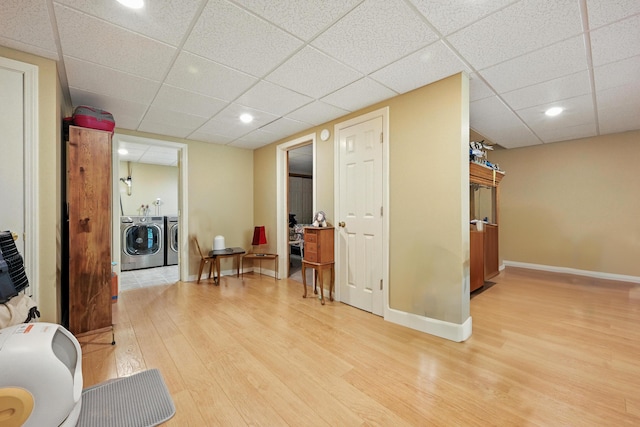 146 Lone Indian Trl, Augusta, ME 04330 - living area with independent washer and dryer, light wood-style flooring, a paneled ceiling, and recessed lighting