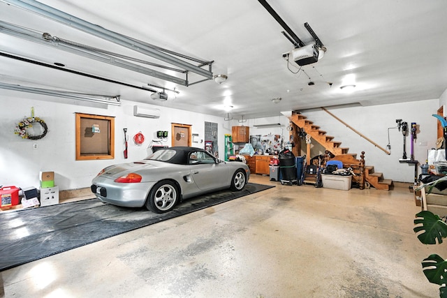146 Lone Indian Trl, Augusta, ME 04330 - garage featuring a garage door opener and an AC wall unit
