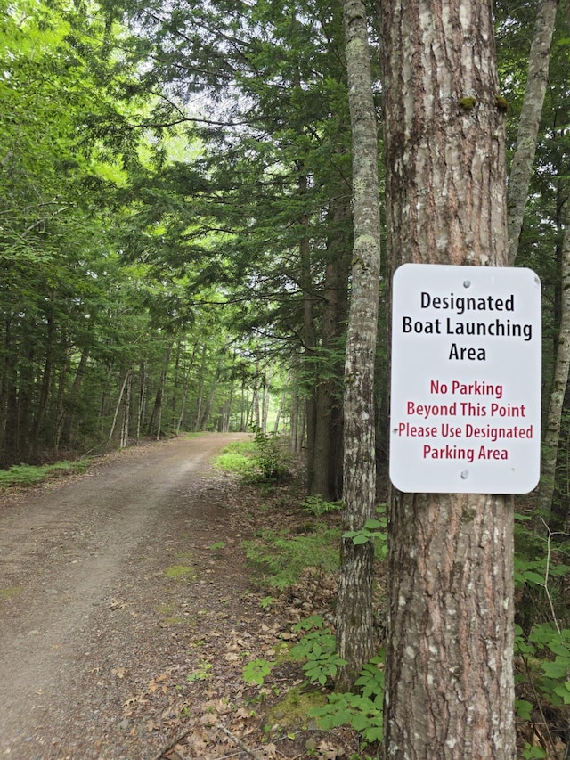 146 Lone Indian Trl, Augusta, ME 04330 - exterior view of a forest and dirt driveway