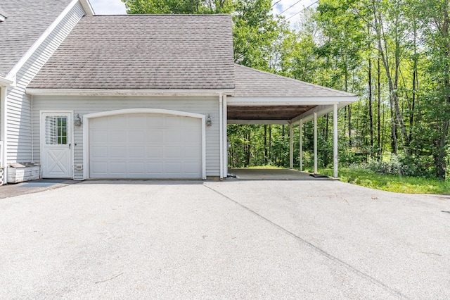 26 Spruce St, Bucksport, ME 04416 - garage featuring asphalt driveway