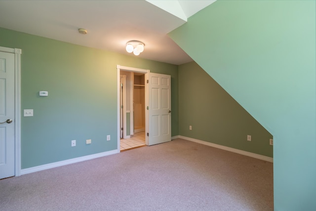 26 Spruce St, Bucksport, ME 04416 - unfurnished bedroom featuring light carpet and a walk in closet
