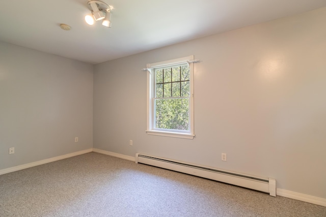 26 Spruce St, Bucksport, ME 04416 - empty room featuring baseboard heating, carpet, and a smoke detector