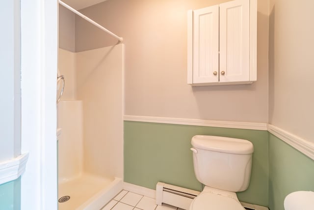 26 Spruce St, Bucksport, ME 04416 - full bathroom featuring a baseboard radiator, a stall shower, and tile patterned floors