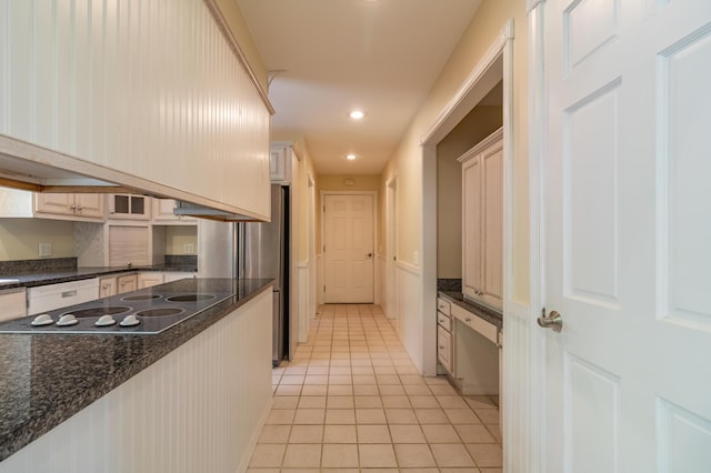 26 Spruce St, Bucksport, ME 04416 - kitchen featuring black electric cooktop, light tile patterned floors, white dishwasher, recessed lighting, and dark stone counters