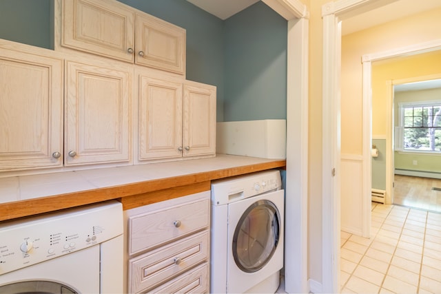 26 Spruce St, Bucksport, ME 04416 - laundry area featuring washer / dryer, light tile patterned flooring, a baseboard radiator, and baseboard heating