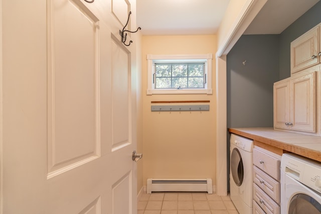26 Spruce St, Bucksport, ME 04416 - laundry room featuring a baseboard heating unit, cabinet space, and light tile patterned floors