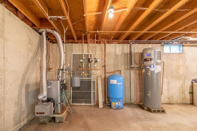 26 Spruce St, Bucksport, ME 04416 - utility room with electric water heater