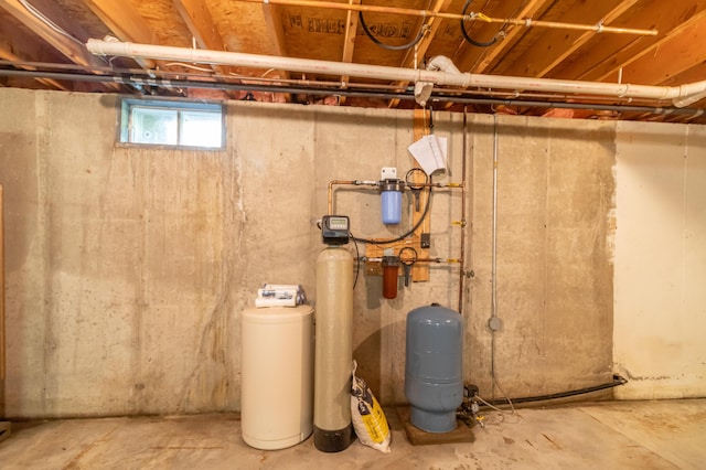 26 Spruce St, Bucksport, ME 04416 - basement featuring a water pressure tank and a water softener