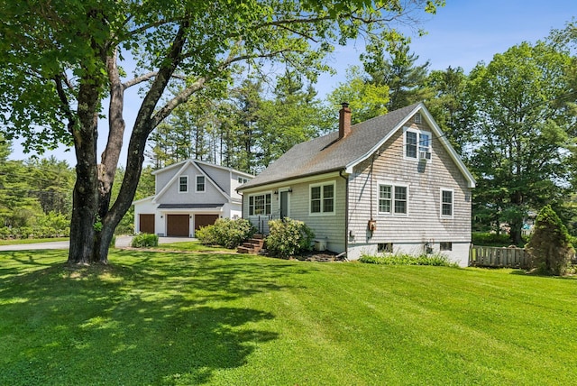 10 Burnell Dr, Yarmouth, ME 04096 - view of front of house with a chimney and a shingled roof