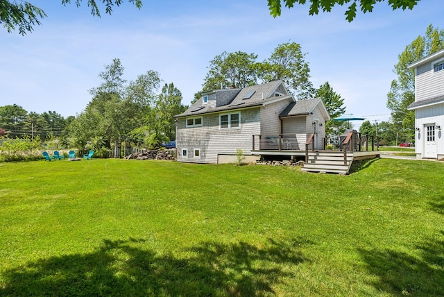 10 Burnell Dr, Yarmouth, ME 04096 - rear view of property featuring a deck and a lawn