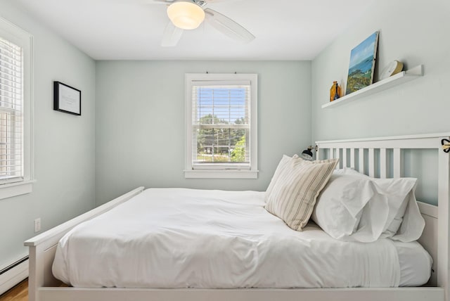 10 Burnell Dr, Yarmouth, ME 04096 - bedroom featuring a baseboard heating unit and ceiling fan