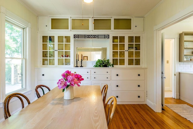 21 Elm St, Belfast, ME 04915 - dining area featuring ornamental molding and wood finished floors
