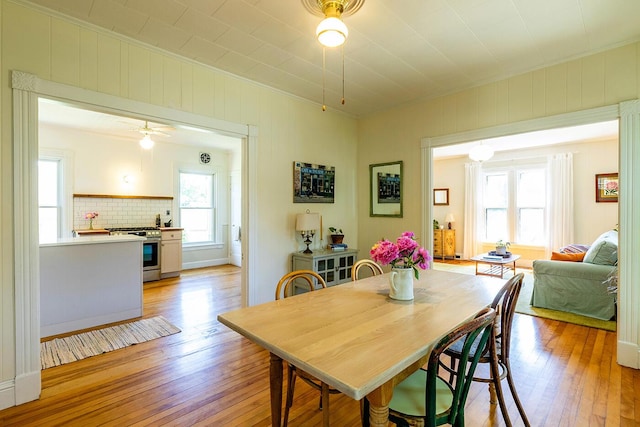 21 Elm St, Belfast, ME 04915 - dining area with ornamental molding and light wood-style flooring