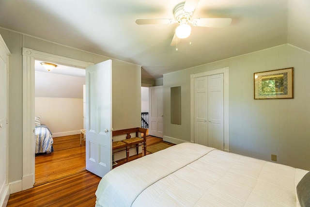 21 Elm St, Belfast, ME 04915 - bedroom with wood finished floors, a closet, a ceiling fan, and lofted ceiling