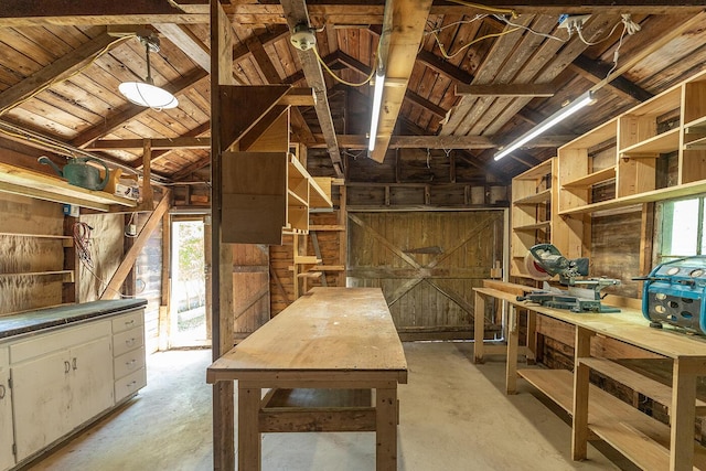 21 Elm St, Belfast, ME 04915 - miscellaneous room featuring unfinished concrete flooring, vaulted ceiling, wooden walls, and wood ceiling