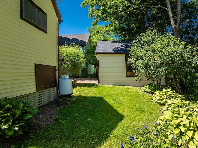 21 Elm St, Belfast, ME 04915 - view of green lawn featuring an outdoor structure