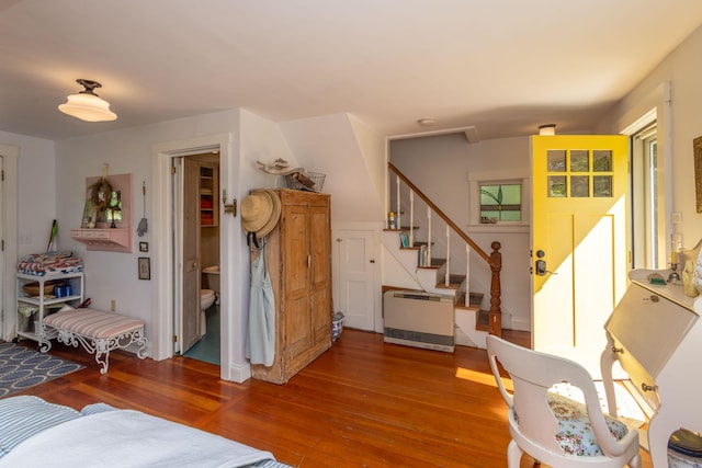 13 Gross Neck Rd, Waldoboro, ME 04572 - living area featuring wood-type flooring, stairs, and heating unit