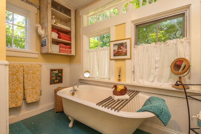 13 Gross Neck Rd, Waldoboro, ME 04572 - bathroom featuring wainscoting, a soaking tub, and healthy amount of natural light