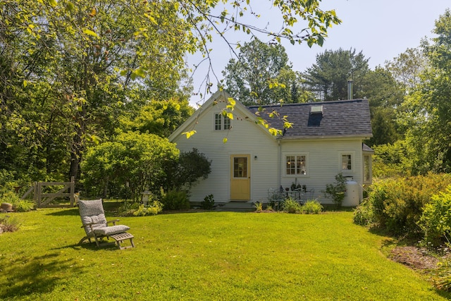 13 Gross Neck Rd, Waldoboro, ME 04572 - rear view of house featuring roof with shingles