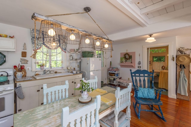 13 Gross Neck Rd, Waldoboro, ME 04572 - dining room with wood finished floors and beam ceiling