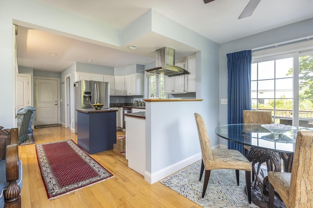 86 Allison Ave, Portland, ME 04103 - dining space with light wood-style flooring and a ceiling fan