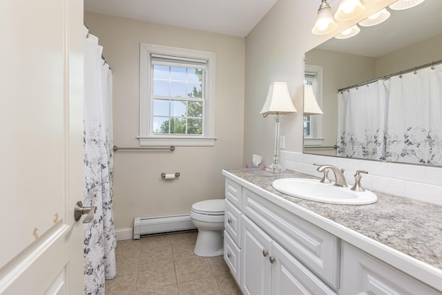 86 Allison Ave, Portland, ME 04103 - full bathroom featuring baseboard heating, vanity, and tile patterned flooring