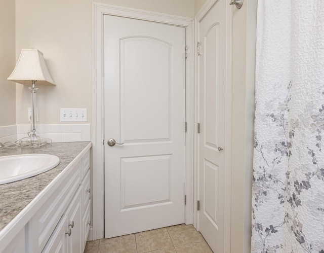 86 Allison Ave, Portland, ME 04103 - bathroom with tile patterned floors and vanity