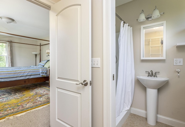 86 Allison Ave, Portland, ME 04103 - bathroom with baseboards and a shower with curtain