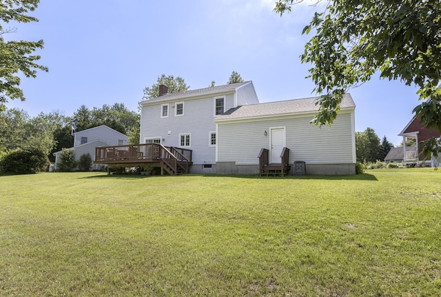86 Allison Ave, Portland, ME 04103 - rear view of house featuring a deck, a chimney, a lawn, and entry steps