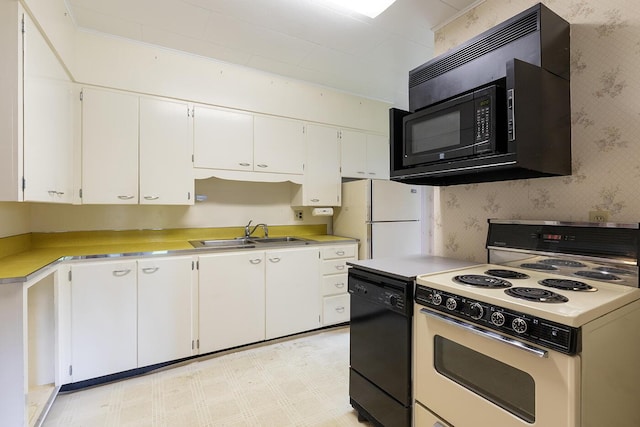 131 Russell Ave, Rockport, ME 04856 - kitchen featuring black appliances, light countertops, white cabinetry, and wallpapered walls