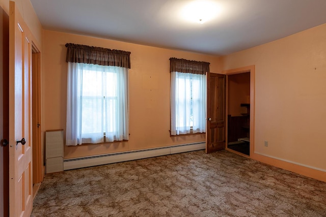 131 Russell Ave, Rockport, ME 04856 - carpeted empty room with a baseboard heating unit