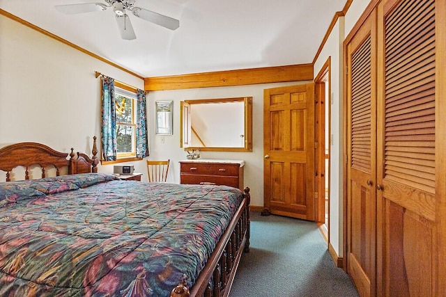 176 Perkins Beach Rd, Wayne, ME 04284 - bedroom featuring dark carpet and ceiling fan