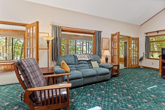 176 Perkins Beach Rd, Wayne, ME 04284 - carpeted living area featuring lofted ceiling and baseboards