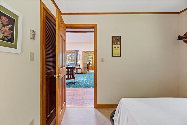 176 Perkins Beach Rd, Wayne, ME 04284 - bedroom with ornamental molding, carpet, and a closet