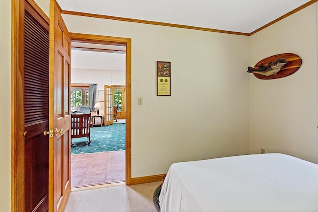 176 Perkins Beach Rd, Wayne, ME 04284 - bedroom featuring light carpet and ornamental molding