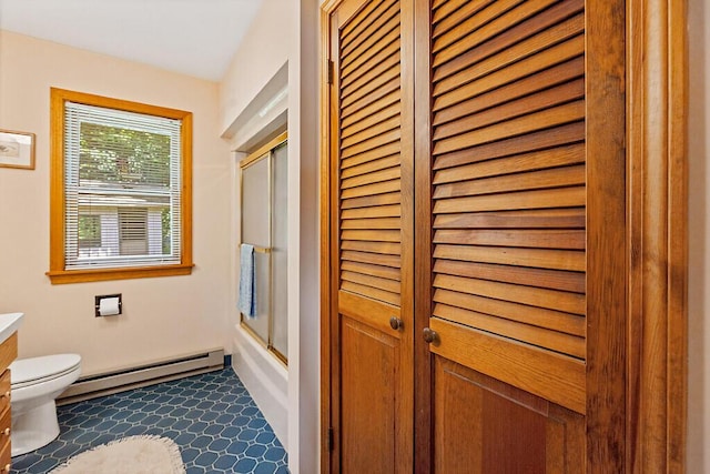 176 Perkins Beach Rd, Wayne, ME 04284 - full bathroom with a baseboard radiator, a closet, vanity, and shower / bath combination with glass door